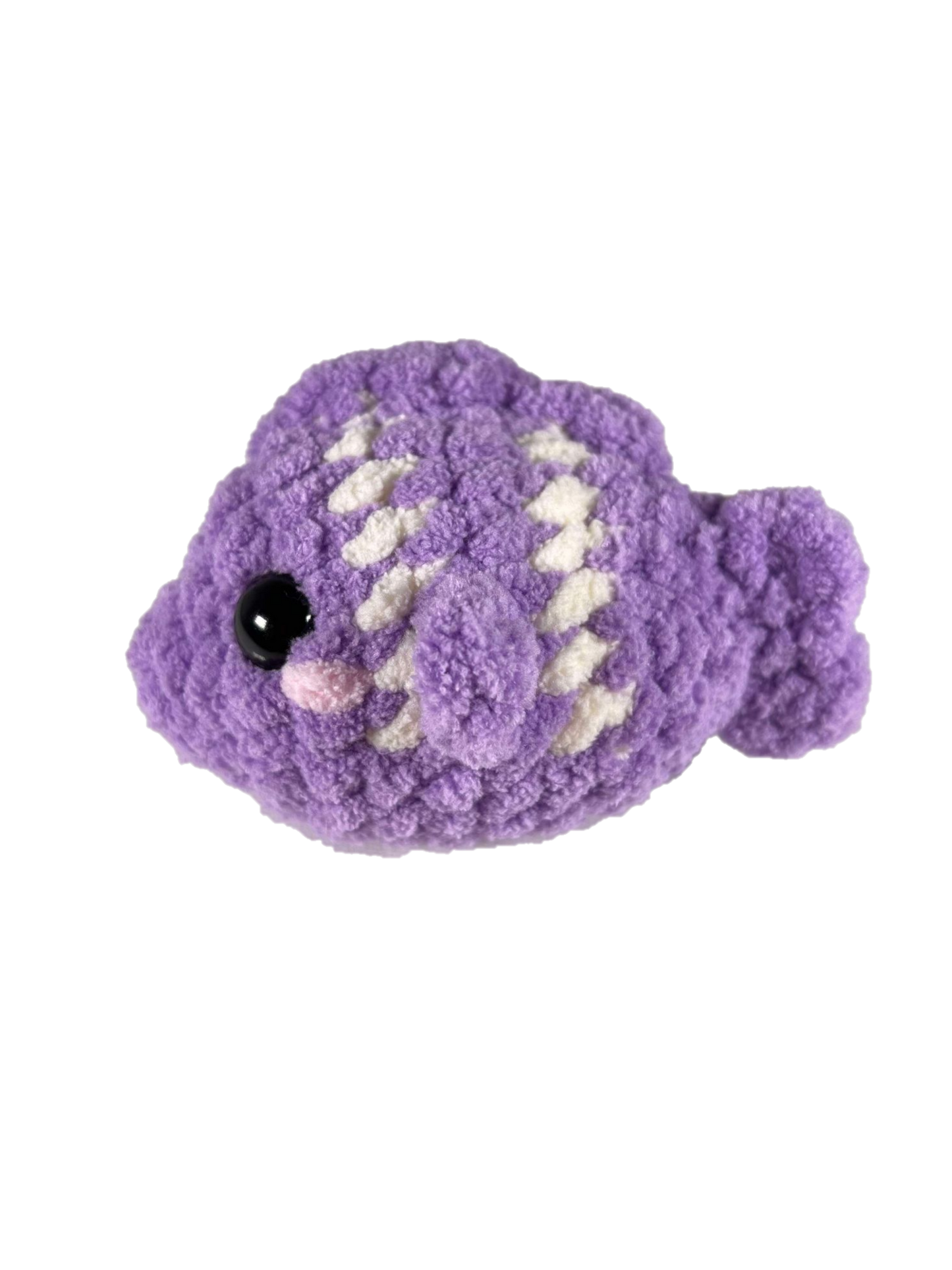 Purple crochet fish plushie with 2 white stripes facing left.