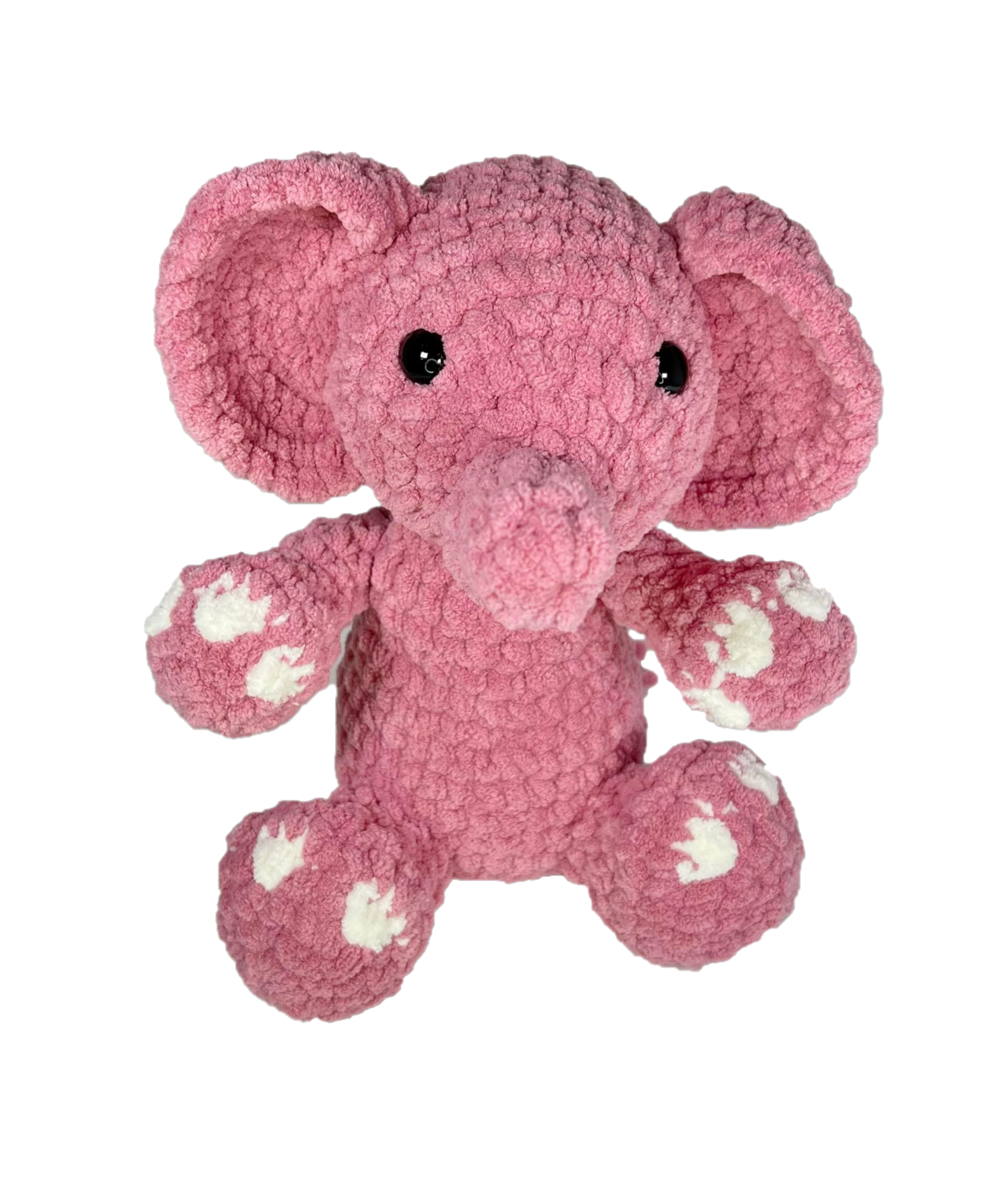 Pink crochet elephant from the front.