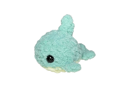 Green crochet shark keychain.