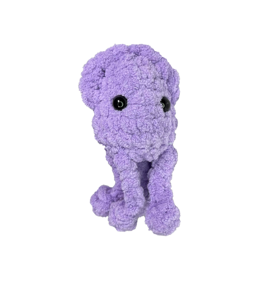 Purple crochet squid keychain.