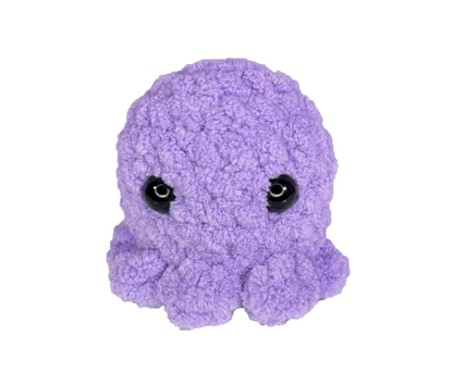 Purple crochet octopus keychain.