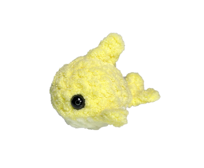 Yellow crochet shark keychain.