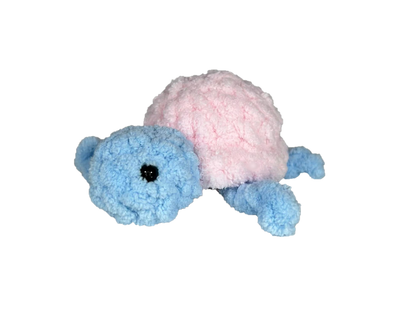 Blue crochet turtle with a pink shell.