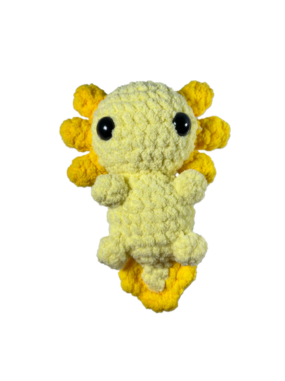 Yellow crochet axolotl with white background.