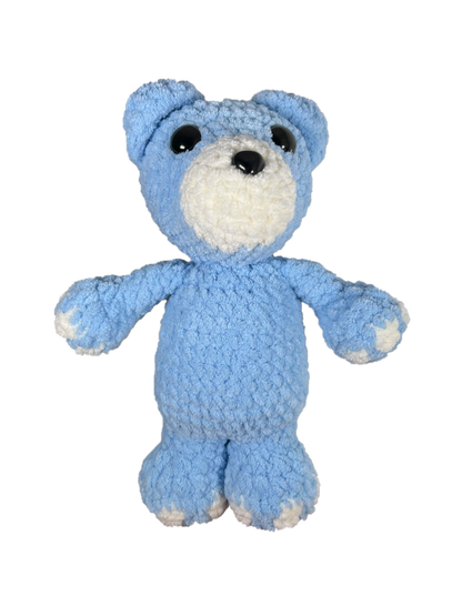 Blue crochet bear standing.