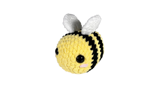 Medium sized yellow crochet bee.