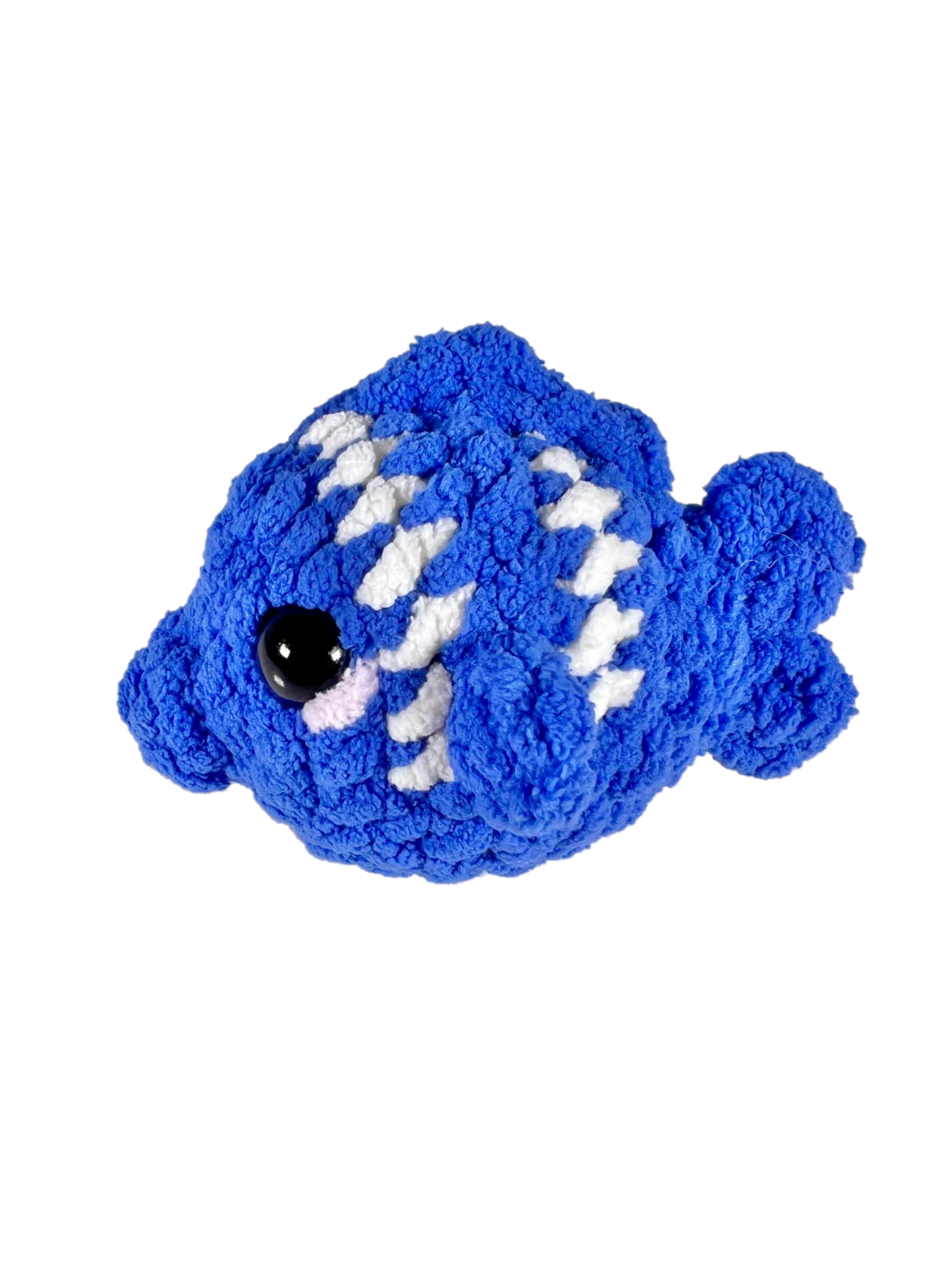 Blue crochet fish plushie with 2 white stripes facing left.