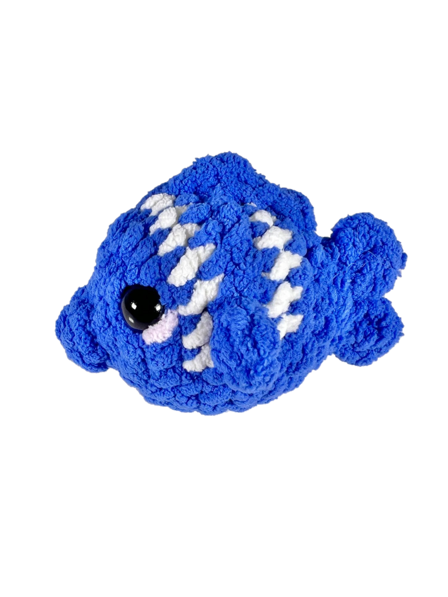 Blue crochet fish plushie with 2 white stripes facing left.