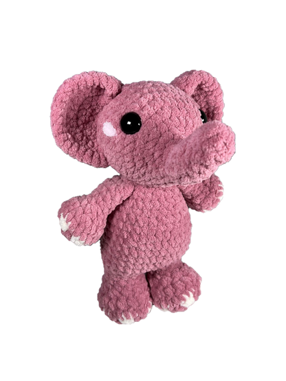 Pink crochet elephant standing on its two hind legs.