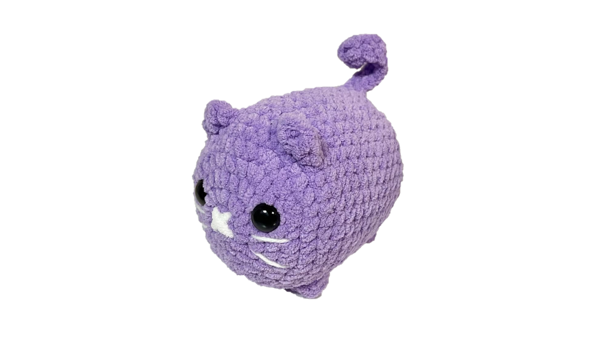 Purple colored crochet loaf cat plushie.