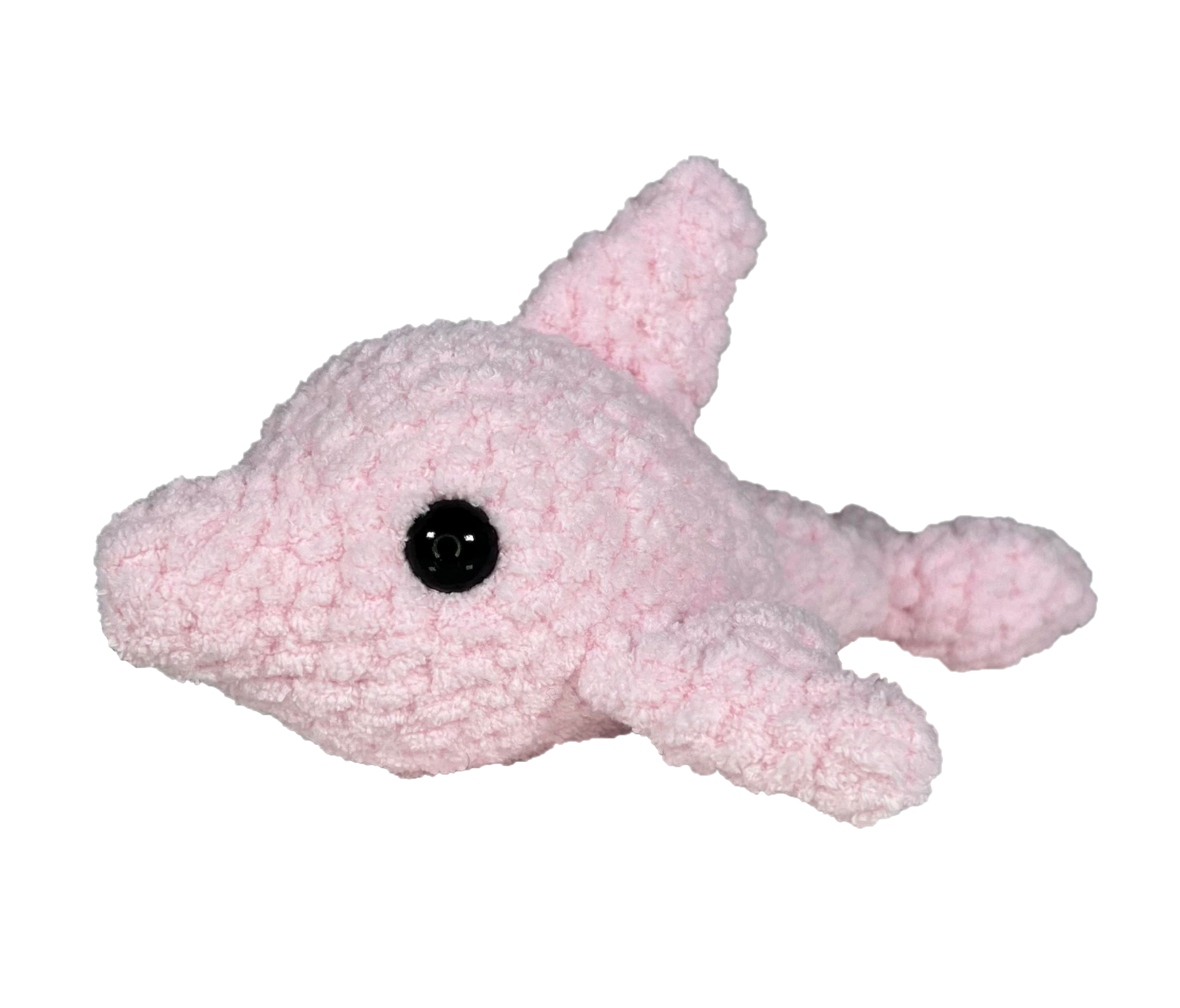 Pink crochet dolphin looking to the left.