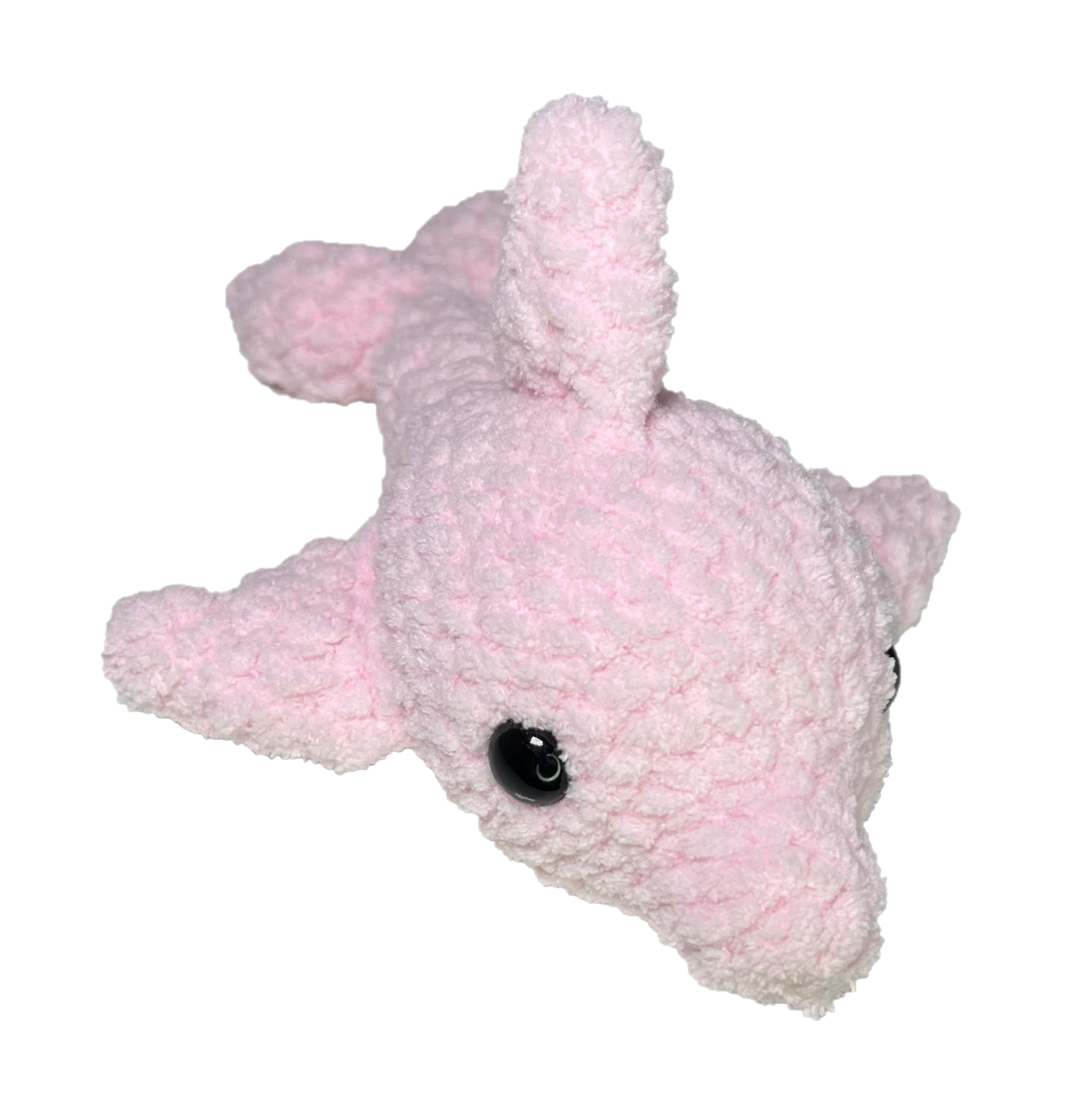 Pink crochet dolphin facing forward.