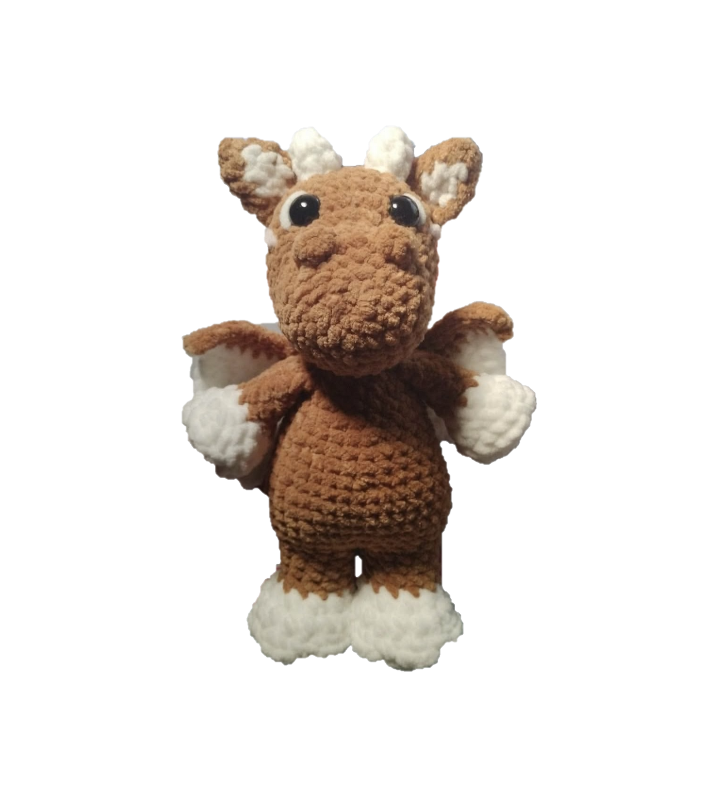 Crocheted toy brown dragon on a white background
