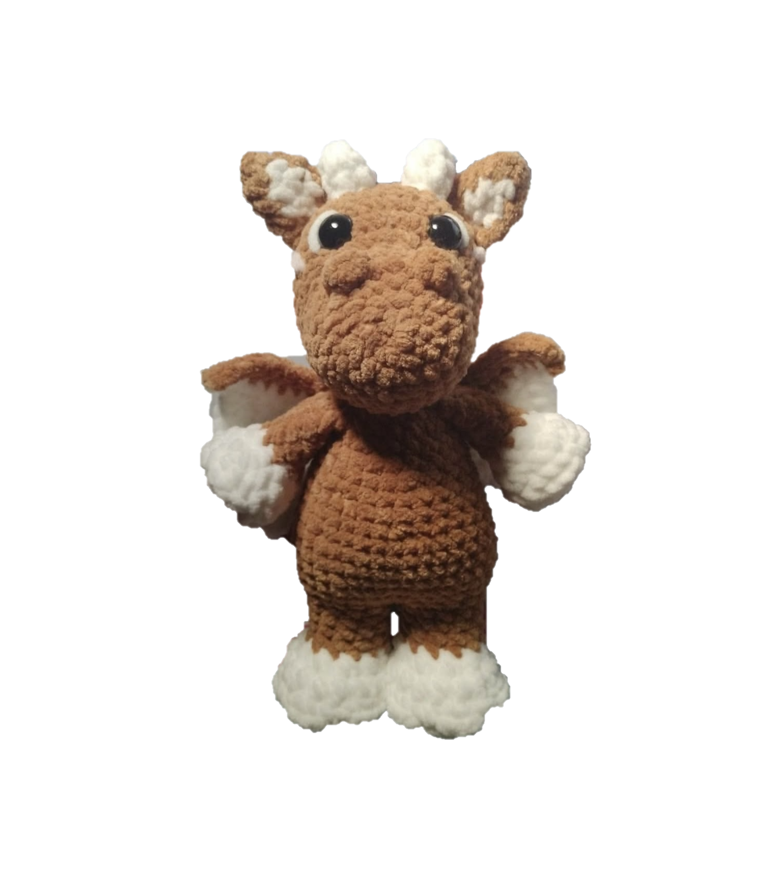Crocheted toy brown dragon on a white background
