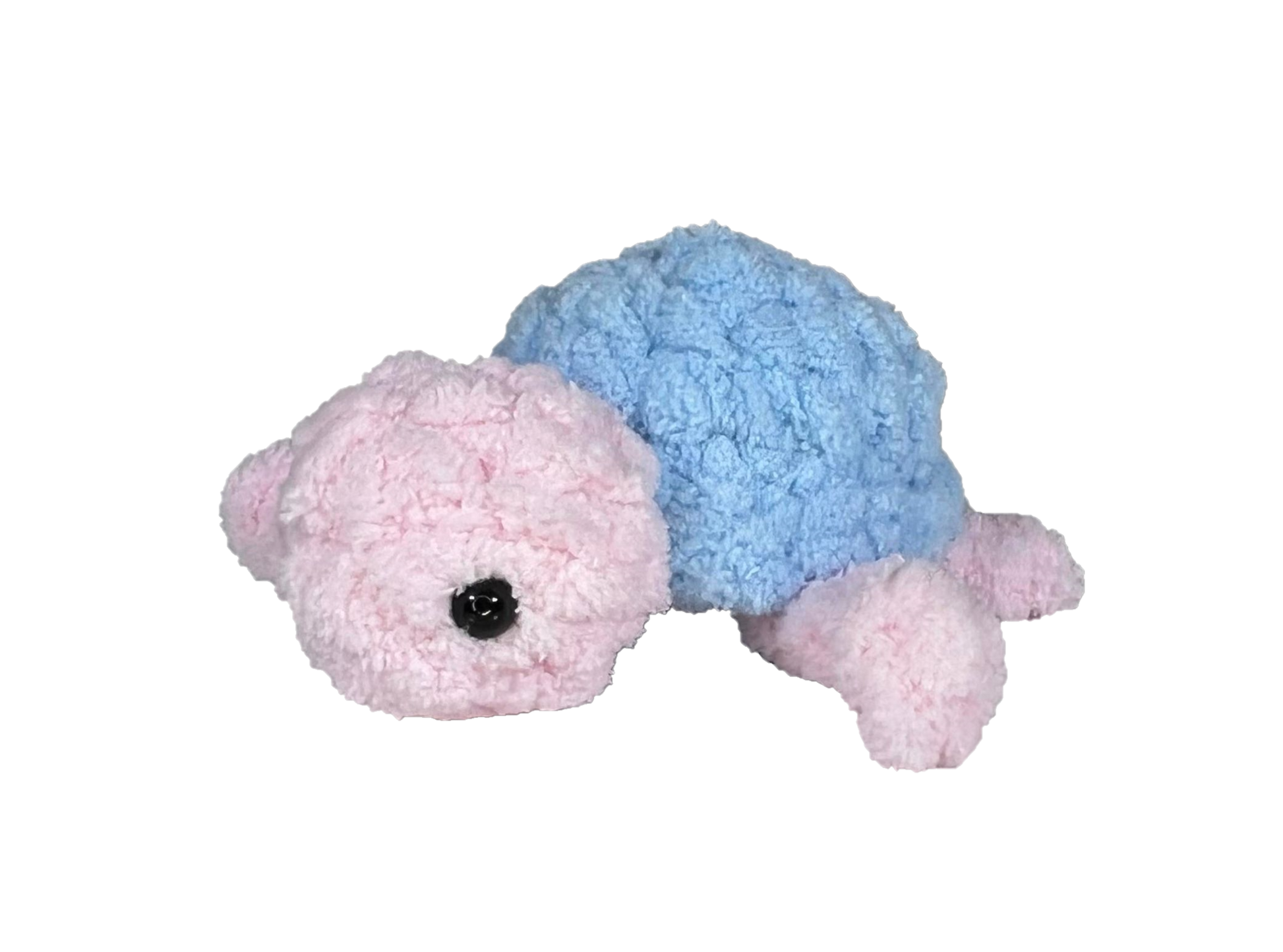 Pink crochet turtle with a blue shell.